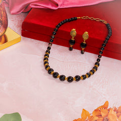 Eykaa jewelry set featuring black tourmaline, black onyx and hakik semi precious stone beside red box, pink cloth and flower
Eykaa
stone jewellery
womens jewellery
earing for women
bracelet for women
necklace for women
jewellery stores