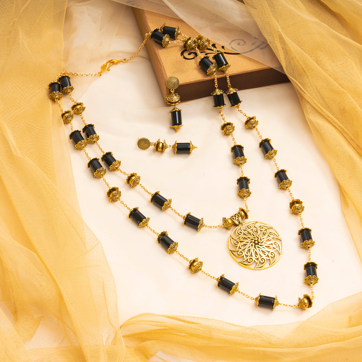 EYKAA GOLDEN CHAIN WITH BLACK ONYX TUBE AND GOLDEN PENDANT DOUBLE LAYERED NECKLACE WITH GOLDEN CHANCE AND EARRINGS