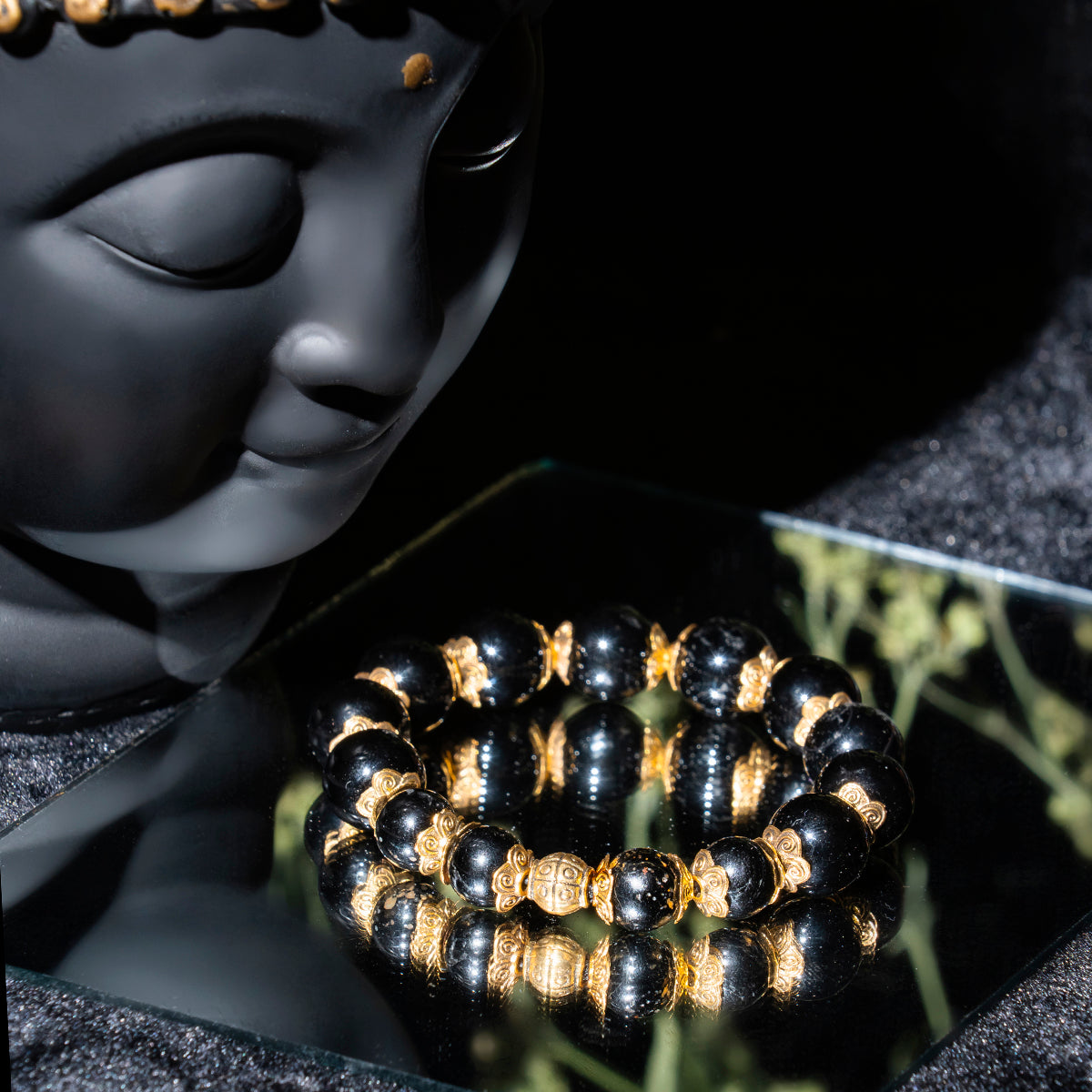 Eykaa bracelet that feature black tourmaline, black onyx and hakik semi precious stone on a mirror surface. 
Eykaa
stone jewellery
womens jewellery
earing for women
bracelet for women
necklace for women
jewellery stores