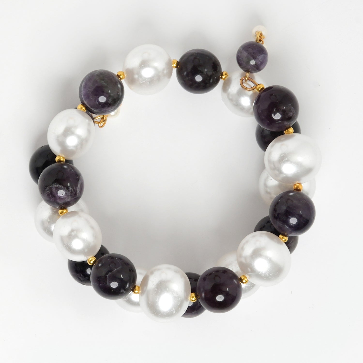 Eykaa Amethyst With Korean Pearl Balls And Shell Pearl Pendant Bracelet On A White Background.
Eykaa
stone jewellery
womens jewellery
earing for women
bracelet for women
necklace for women
jewellery stores