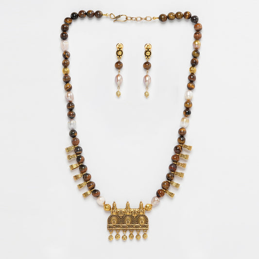 Eykaa Freshwater Pearl And Tiger Eye Necklace With Earrings On A White Background.
Eykaa
stone jewellery
womens jewellery
earing for women
bracelet for women
necklace for women
jewellery stores