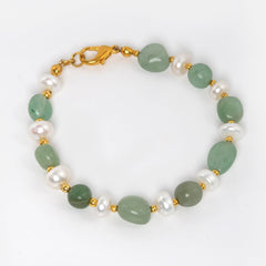 Eykaa Green Aventurine With Freshwater Pearl, Silver Strawberry Quartz, And Shell Pearl Bracelet On A White Background.