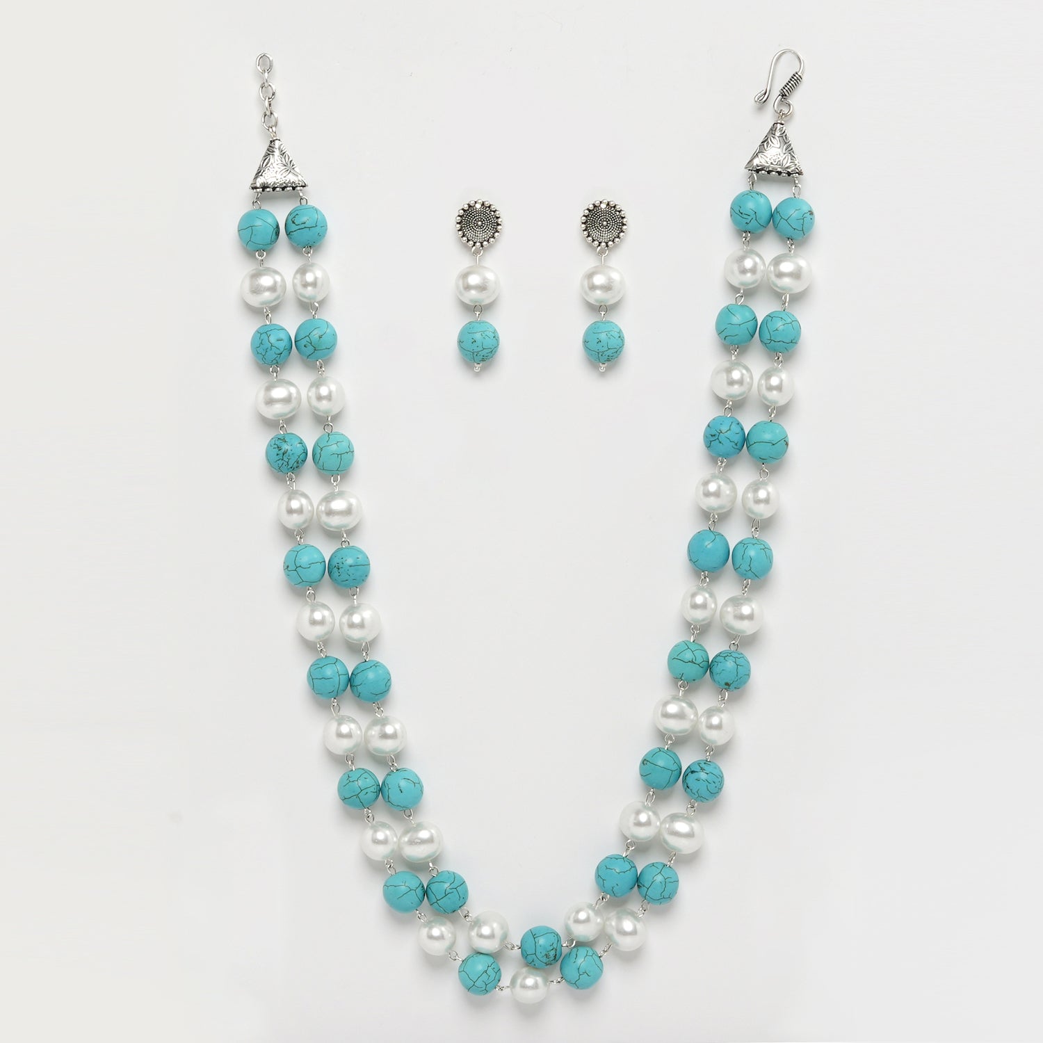 Eykaa Firoza With Korean Pearl Balls Layered Necklace With Earrings  On A White Background.
Eykaa
stone jewellery
womens jewellery
earing for women
bracelet for women
necklace for women
jewellery stores