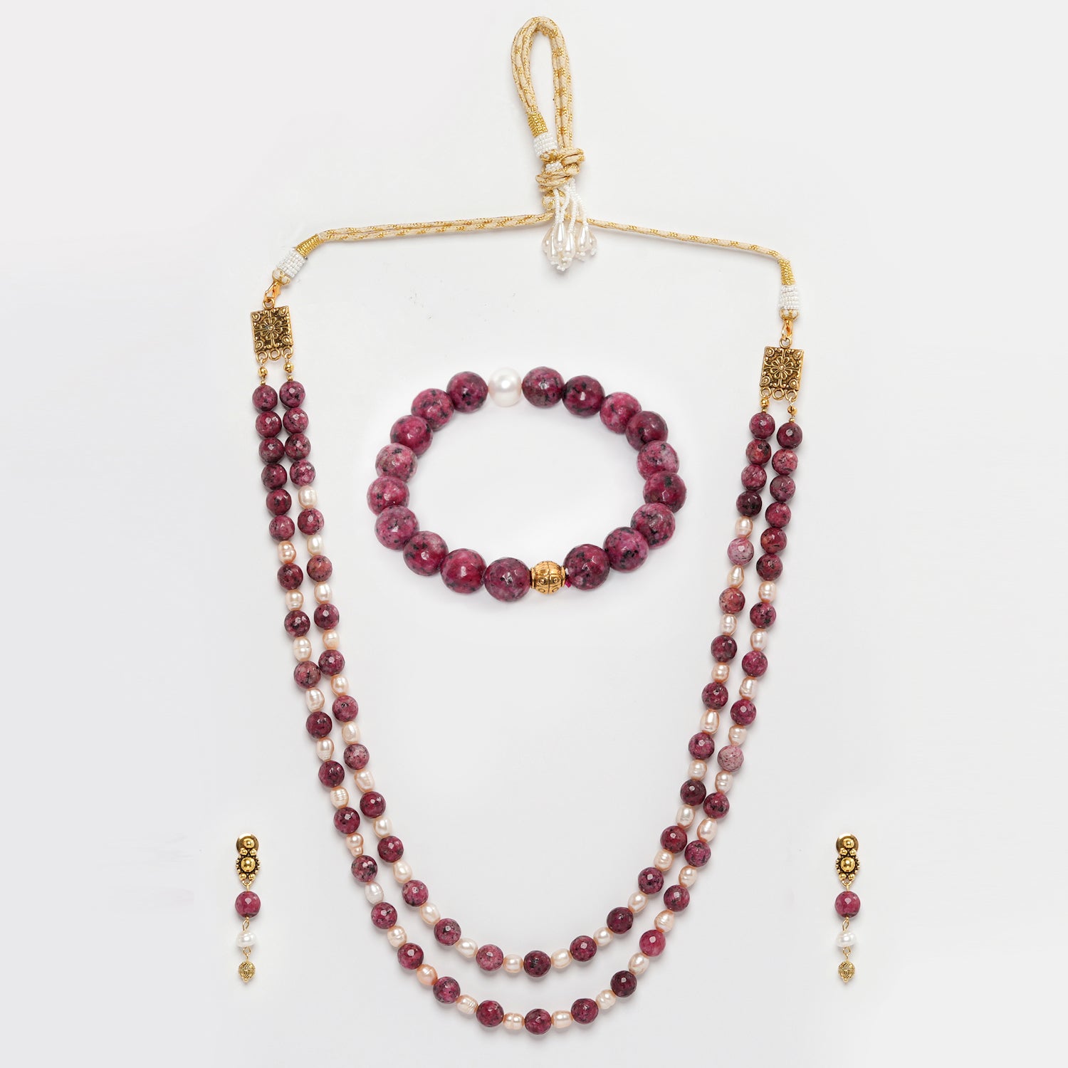 Eykaa Dalmatian And Freshwater Pearl Necklace With Earrings  And Bracelet On A White Background.
Eykaa
stone jewellery
womens jewellery
earing for women
bracelet for women
necklace for women
jewellery stores