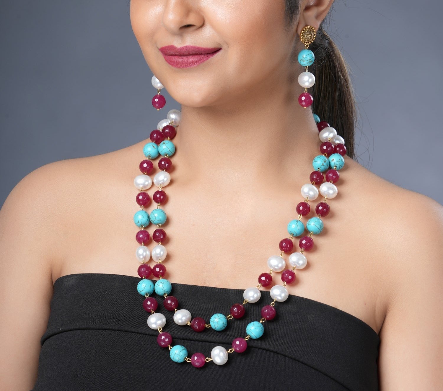 Girl Model Wearing Eykaa Firoza And Maroon Jade With Korean Pearl Ball Layered Necklace With Earrings.
Eykaa
stone jewellery
womens jewellery
earing for women
bracelet for women
necklace for women
jewellery stores