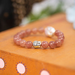 Eykaa Strawberry Quartz And Freshwater Pearl Bracelet Displayed On A Textured Orange Surface.
Eykaa
stone jewellery
womens jewellery
earing for women
bracelet for women
necklace for women
jewellery stores