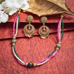 Eykaa Jade With Agate And Shell Pearl Necklace With Earrings On A Textured Red Background With White Flowers.