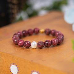 Eykaa Dalmatian And Freshwater Pearl Bracelet Displayed On A Textured Orange Surface.
Eykaa
stone jewellery
womens jewellery
earing for women
bracelet for women
necklace for women
jewellery stores