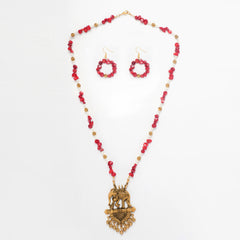Eykaa White And Red Coral Necklace With Golden Beads  Pendant And  Earrings On A White Background.