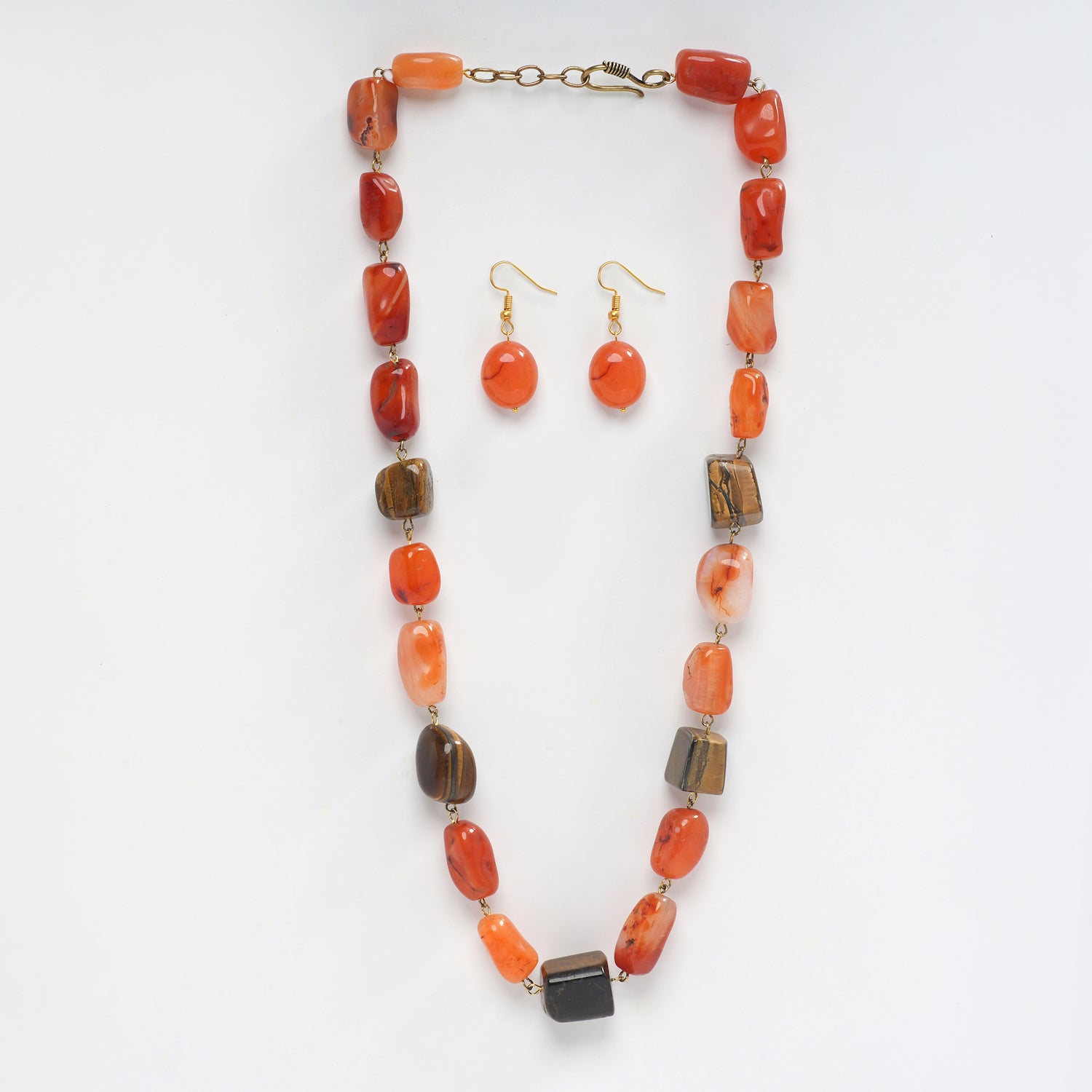 Eykaa necklace and earrings that feature Tiger Eye and Leon Tumble semi precious stones on a white background. 
Eykaa
stone jewellery
womens jewellery
earing for women
bracelet for women
necklace for women
jewellery stores