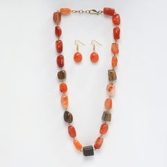 Eykaa necklace and earrings that feature Tiger Eye and Leon Tumble semi precious stones on a white background. 
Eykaa
stone jewellery
womens jewellery
earing for women
bracelet for women
necklace for women
jewellery stores