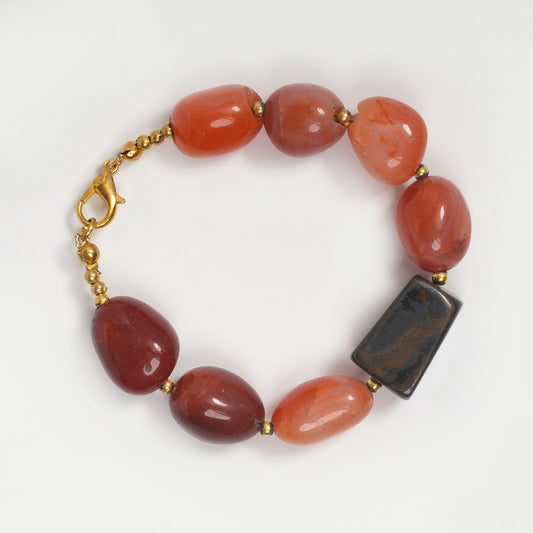 Eykaa Bracelet that features leon with tiger eye semi precious stones on a white background.
Eykaa
stone jewellery
womens jewellery
earing for women
bracelet for women
necklace for women
jewellery stores