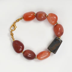 Eykaa Bracelet that features leon with tiger eye semi precious stones on a white background.
Eykaa
stone jewellery
womens jewellery
earing for women
bracelet for women
necklace for women
jewellery stores