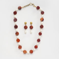 Eykaa Carnelian And Freshwater Pearl Necklace With Earrings On A White Background.
Eykaa
stone jewellery
womens jewellery
earing for women
bracelet for women
necklace for women
jewellery stores
