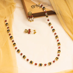 EYKAA CLEAR QUARTZ, RED ONYX AND LAVA NECKLACE WITH EARRINGS.