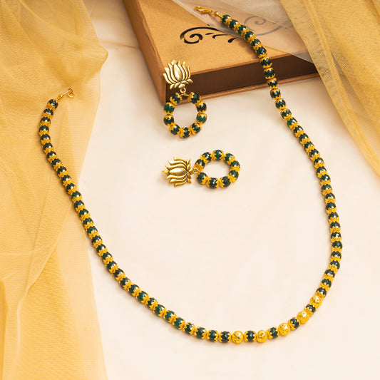 EYKAA GREEN JADE AND GOLDEN LAVA NECKLACE WITH EARRINGS.