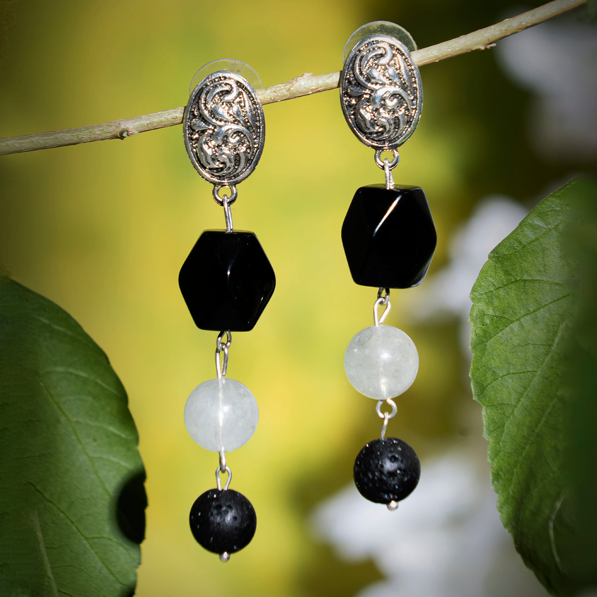 Eykaa  Aquamarine With Lava And Black Onyx Earrings Hanging On The Tree Branch.