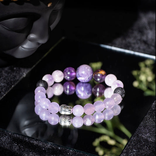 Eykaa faceted jade with kunzite and amethyst semi precious stone with silver beads bracelet on mirror surface.