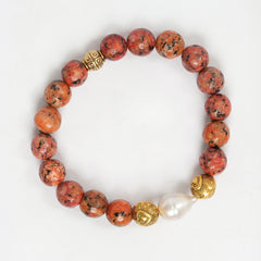 Eykaa Orange Dalmatian And Freshwater Pearl Bracelet On A White Background.