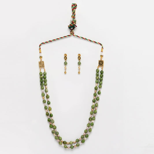 Eykaa Green Dalmatian And Fresh Water Pearl Necklace With Earrings On A White Background.