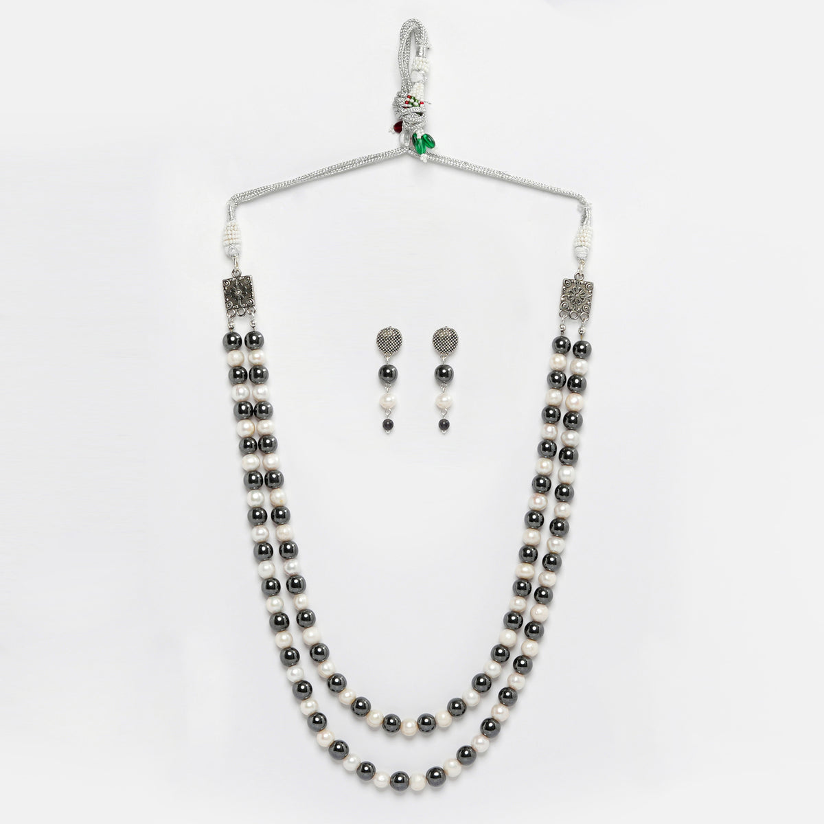 Eykaa Hematite And Freshwater Pearl Necklace With Earrings On A White Background.