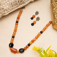 EYKAA ORANGE AVENTURINE, BLACK TOURMALINE AND SMOKY QUARTZ NECKLACE WITH EARRINGS