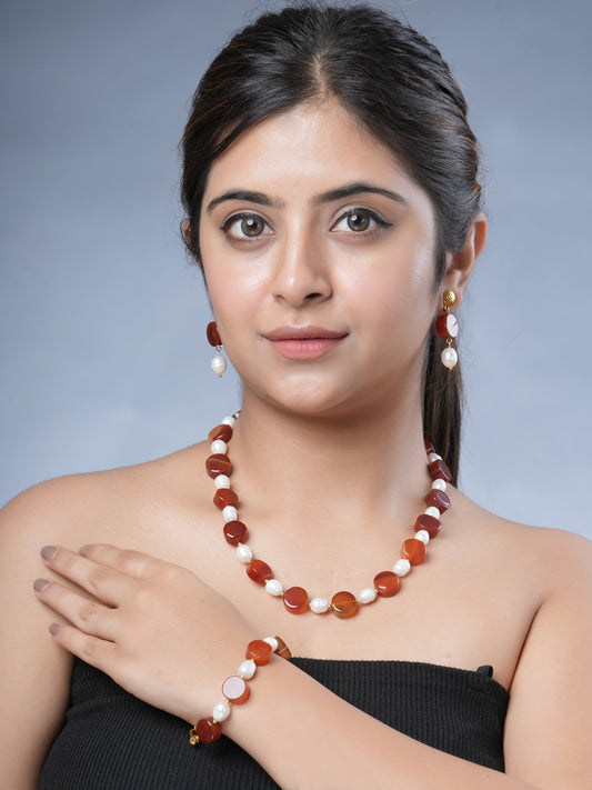 Girl Model Eykaa Carnelian And Freshwater Pearl Necklace With Earrings And A Bracelet.

Eykaa
stone jewellery
womens jewellery
earing for women
bracelet for women
necklace for women
jewellery stores