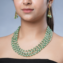 Girl model wearing Eykaa green strawberry quartz and shell pearls semi precious stone earrings  and necklace.

Eykaa
stone jewellery
womens jewellery
earing for women
bracelet for women&nbsp;
necklace for women&nbsp;
jewellery stores