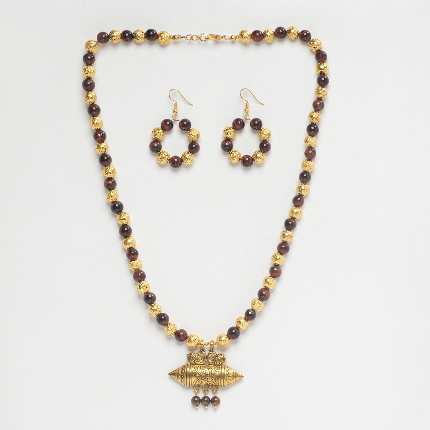 RED TIGER EYE, GOLDEN LAVA AND TIGER EYE, AND GOLDEN PENDANT NECKLESS WITH EARRINGS.