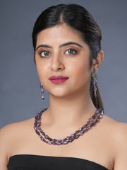  Girl model wearing Eykaa necklace and earrings that feature amethyst semi precious stone.    