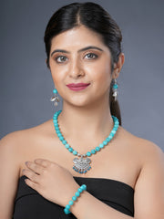 Girl Model Wearing  Necklace With Earrings And A Bracelet. 