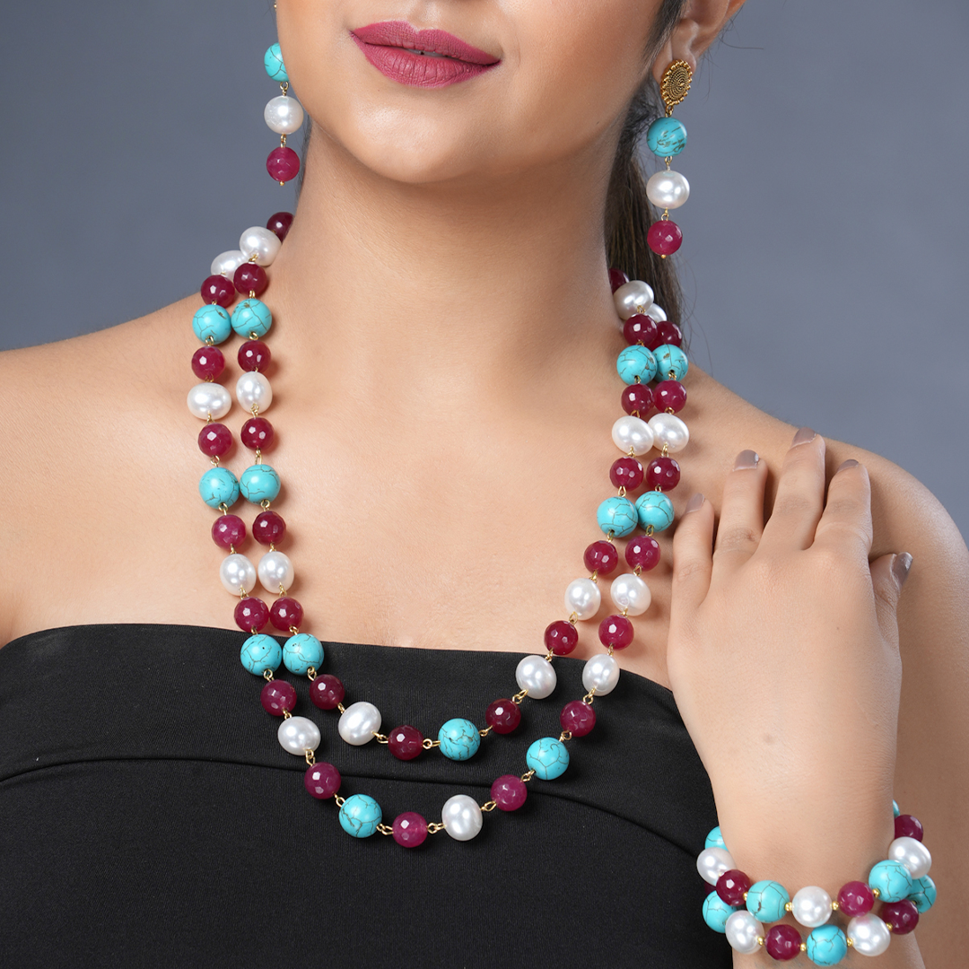  Girl Model Wearing Eykaa Firoza And Maroon Jade Korean Pearl Ball Bracelet With Earrings And A Necklace.

Eykaa
stone jewellery
womens jewellery
earing for women
bracelet for women
necklace for women
jewellery stores