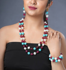 Girl Model Wearing Eykaa Firoza, Maroon Jade With Korean Pearl Ball Necklace With Earrings And A Bracelet.