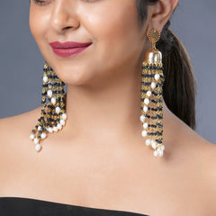 Girl Model Wearing Eykaa Grey Faceted Jade And Fresh Water Pearl Earrings.