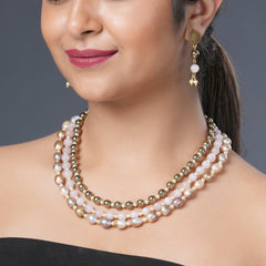 Girl Model Wearing Eykaa Layered Hematite, Rose Quartz, Freshwater Pearl, And Shell Pearl Necklace With Earrings.