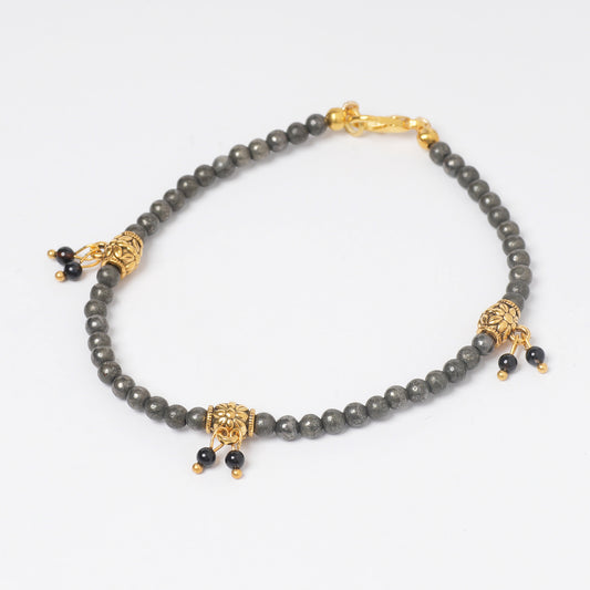 EYKAA PYRITE  WITH BLACK ONYX AND  GOLDEN SPACER BEADS ANKLET