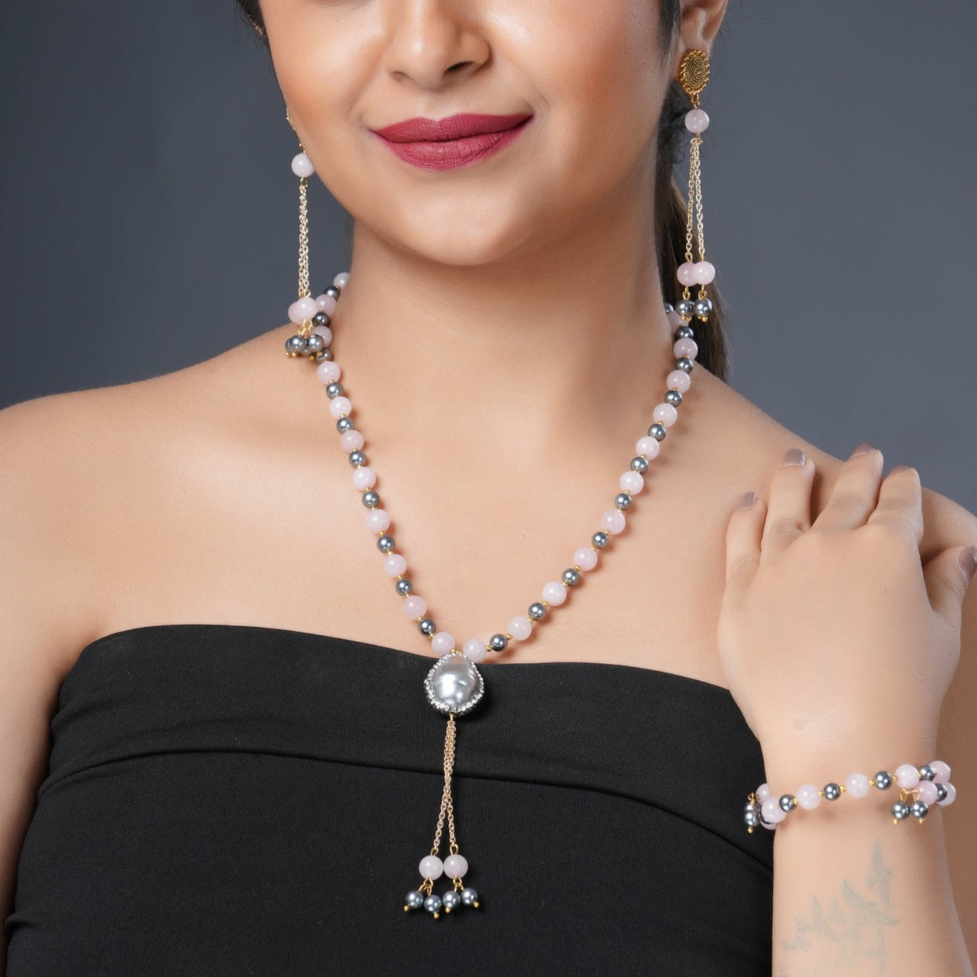 Girl Model Wearing Eykaa Green Aventurine With Freshwater Pearl, Silver Strawberry Quartz, And Shell Pearl Necklace With Earrings And Bracelet.