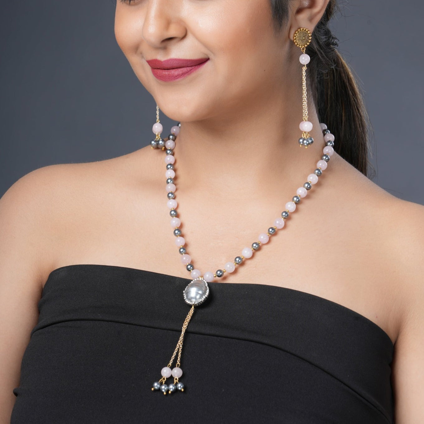 Girl Model Wearing Eykaa Green Aventurine With Freshwater Pearl, Silver Strawberry Quartz, And Shell Pearl Necklace With Earrings. 