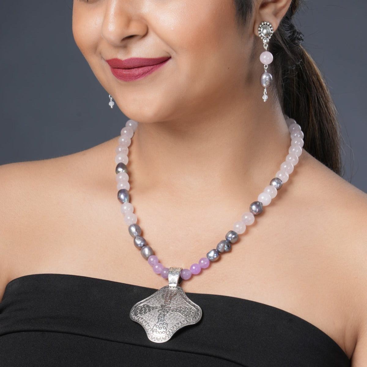 Girl Model Wearing Eykaa Rose Quartz, Jade, And Freshwater Pearl Necklace With Earrings.