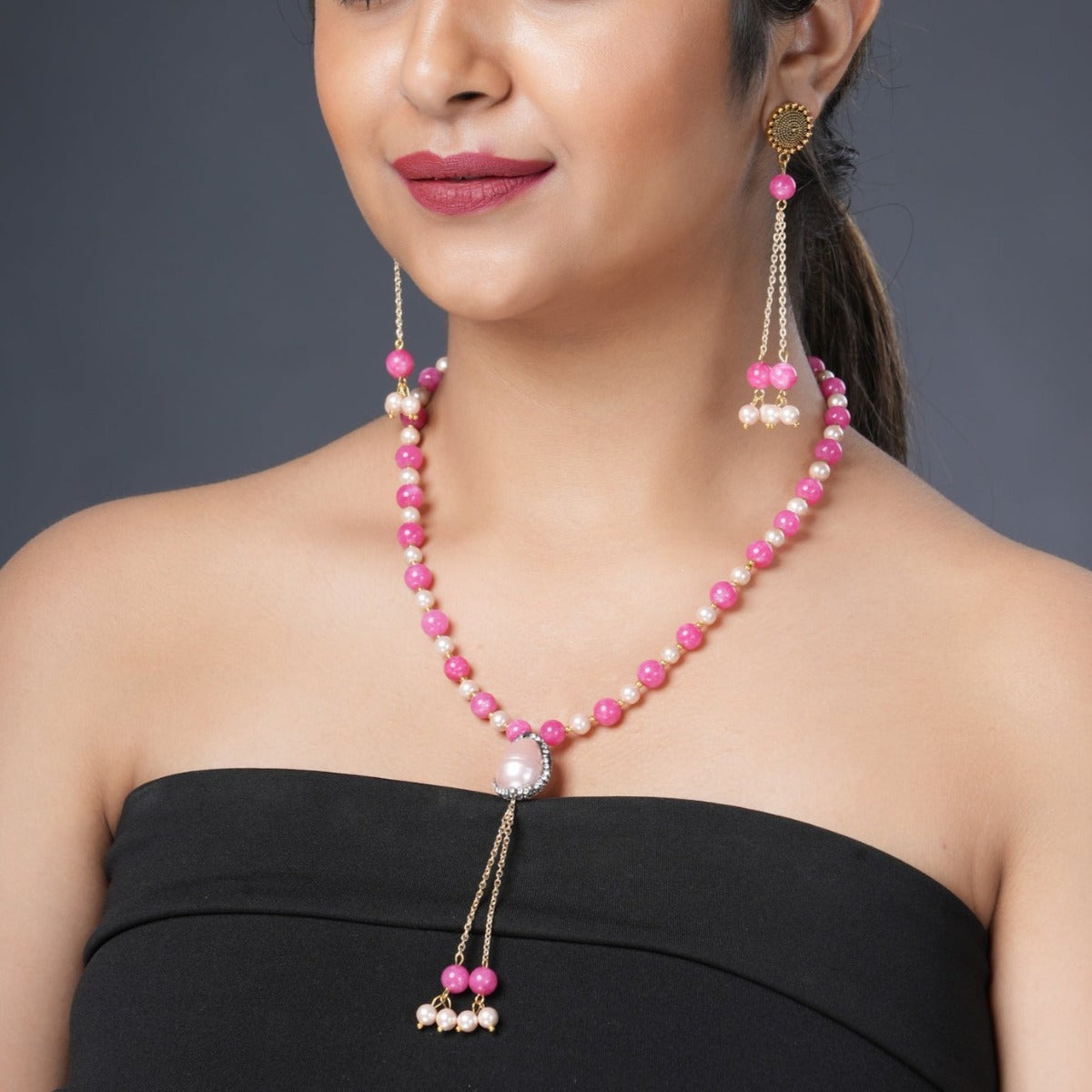 Girl Model Wearing Eykaa Pink Jade With Shell Pearl Necklace With Earrings.