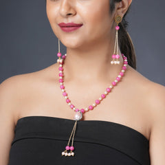 Girl Model Wearing Eykaa Pink Jade With Shell Pearl Necklace With Earrings.