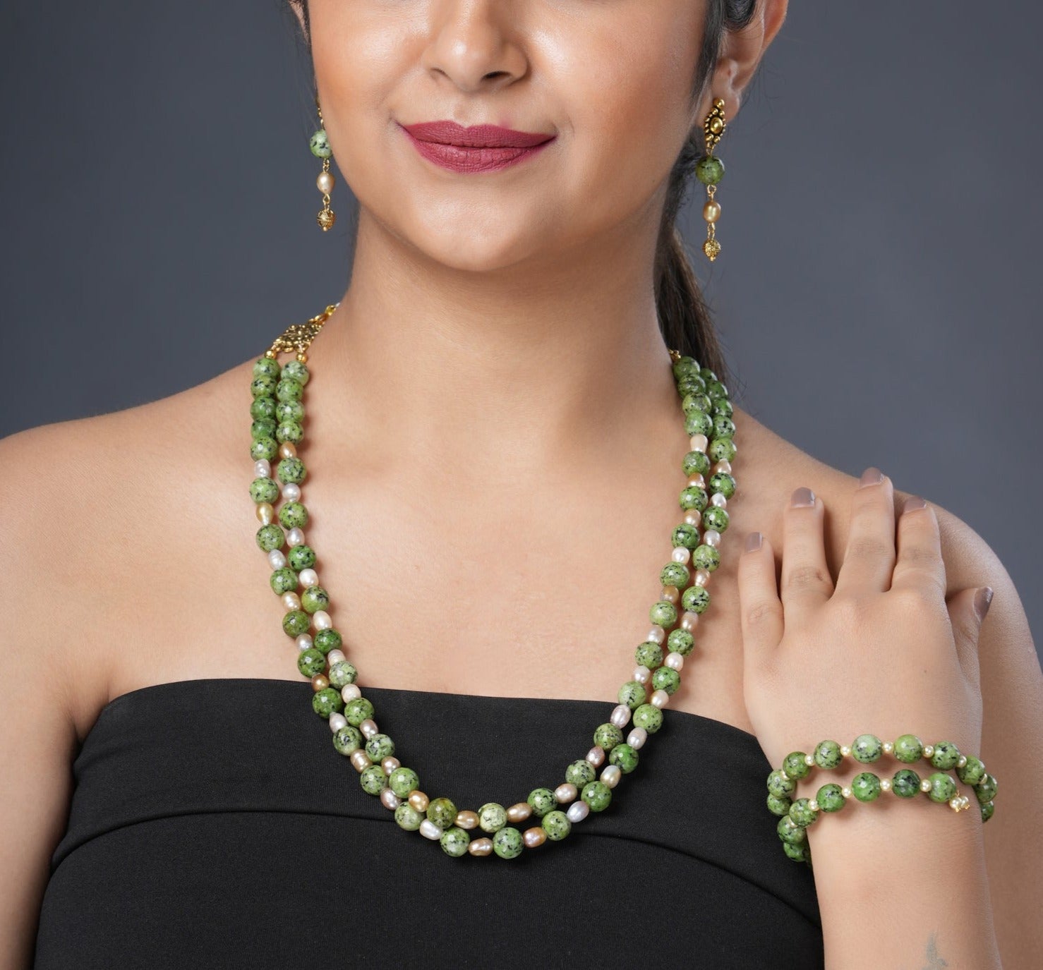 Girl Model Wearing Eykaa Dalmatian with Freshwater Pearl Bracelet and Matching Necklace with Earrings.