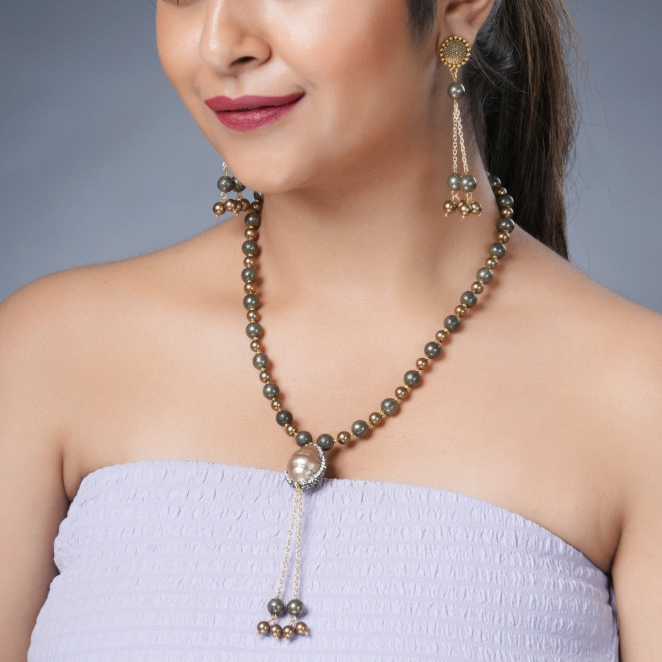 Girl Model Wearing Eykaa Pyrite With Shell Pearls Necklace With Earrings.