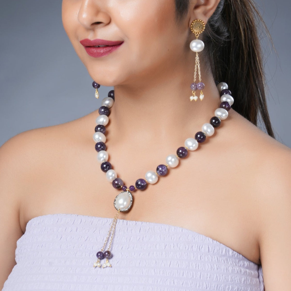 Girl Model Wearing Eykaa Amethyst With Korean Pearl Balls And Shell Pearl Necklace With Earrings.

Eykaa
stone jewellery
womens jewellery
earing for women
bracelet for women
necklace for women
jewellery stores