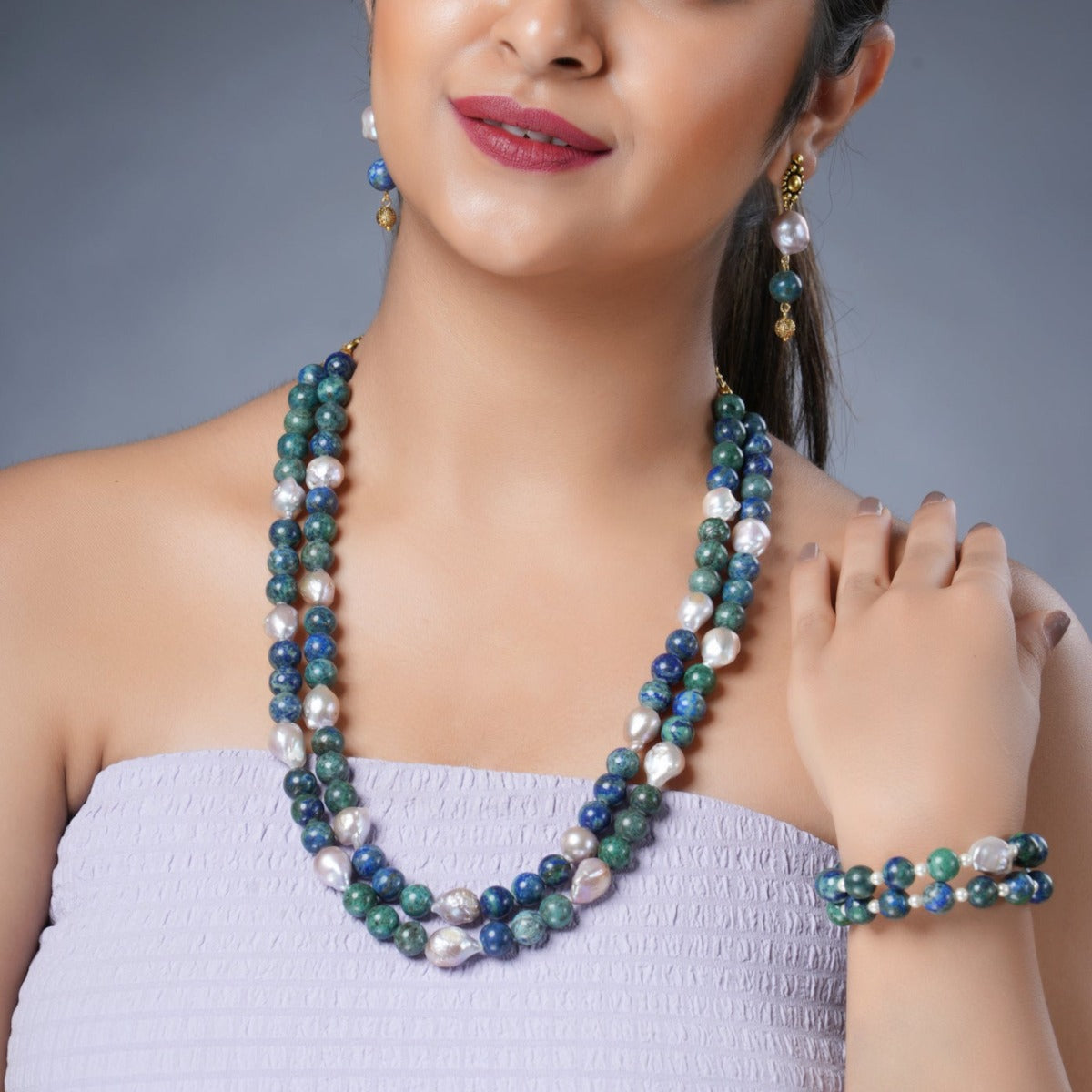 Girl Model Wearing Eykaa Azurite With Freshwater Pearl Necklace With Earrings And A Bracelet.