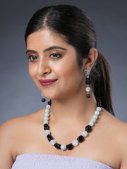 Girl Model Eykaa Aquamarine With Lava And Black Onyx Necklace With Earrings.