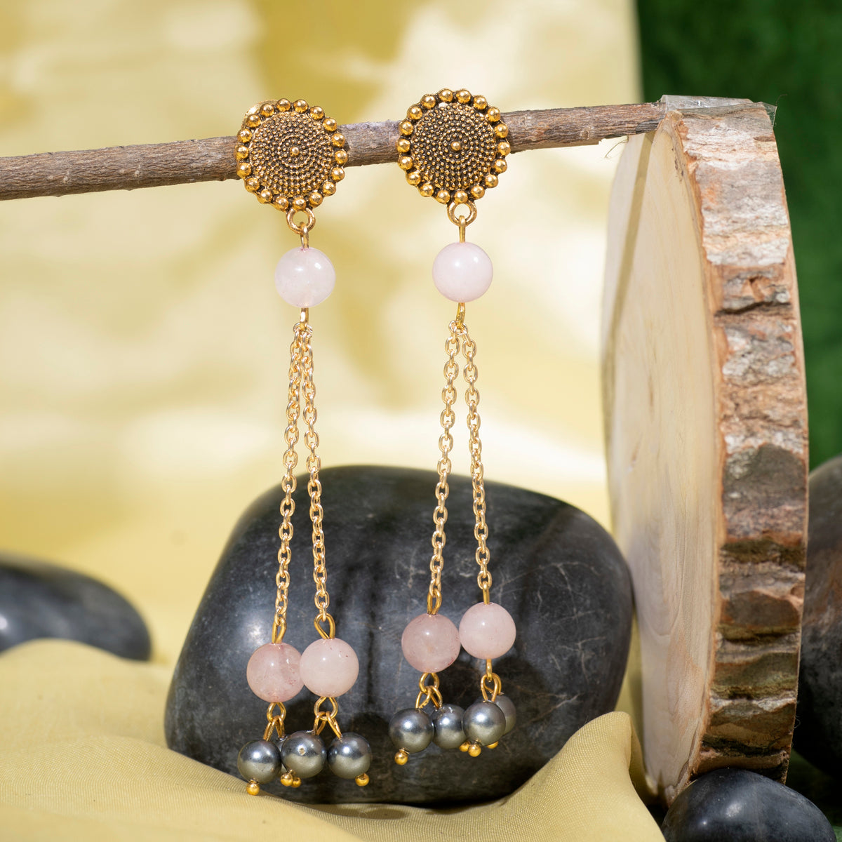 Eykaa Rose Quartz With Shell Pearls And Shell Pearl  Earrings Hanging On The Tree Branch.