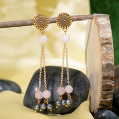 Eykaa Rose Quartz With Shell Pearl Earrings Hanging On The Tree Branch.