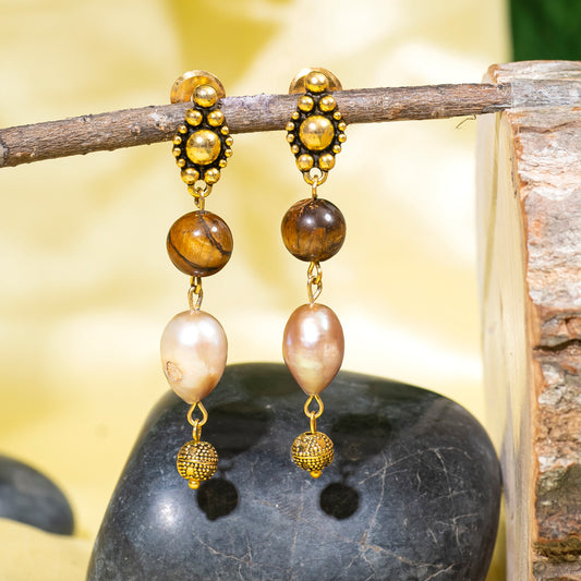 Eykaa Freshwater Pearl And Tiger Eye Earrings Hanging On The Tree Branch.