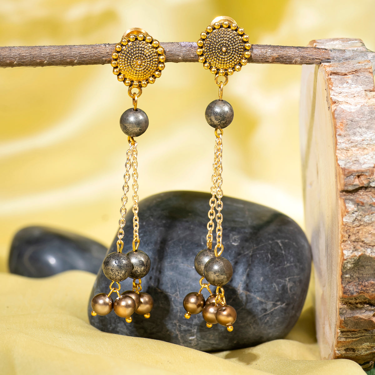  Eykaa Pyrite With Shell Pearls And Shell Pearl Earrings Hanging On The Tree Branch..